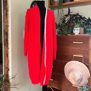 Long red open front cardigan size XS by Lego.